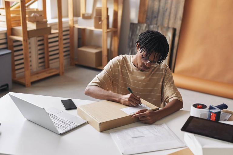 Man working at warehouse for online store